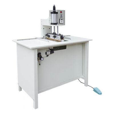 Machine à arrondir les dos de reliure cartonnée HX700CBR arrondit pneumatiquement les dos avec des moules chauffants et une alimentation manuelle facile